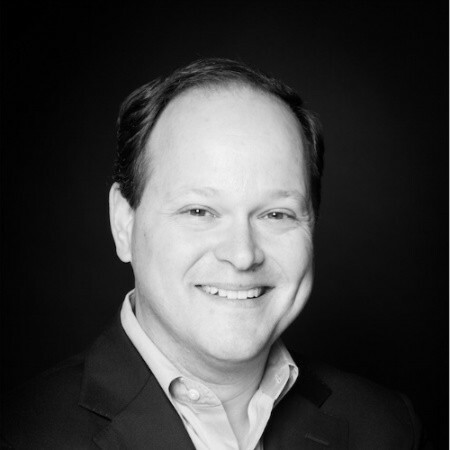 Photo of Chris Cahill, former EVP Finance at Unified